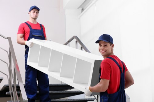 Loading boxes and furniture into a van in Streatham