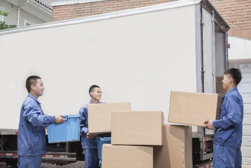 Packed boxes and furniture ready for local apartment removals