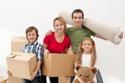 Moving team handling furniture during a Streatham relocation