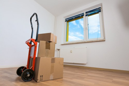 Preparation for a home move with boxes and furniture in Streatham