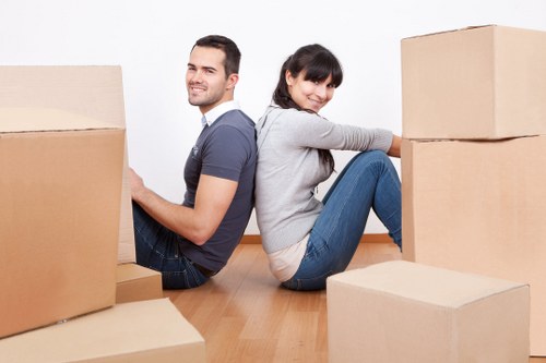 Packed boxes and moving equipment ready for a home removal in Streatham